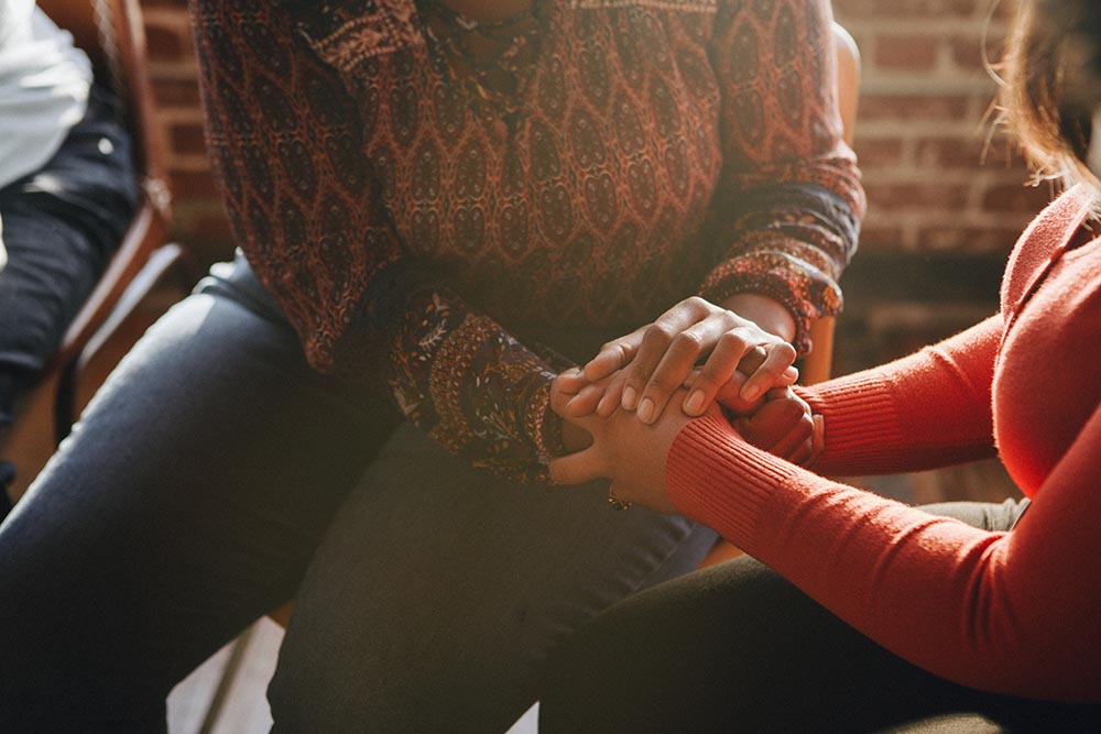 Women supporting each other